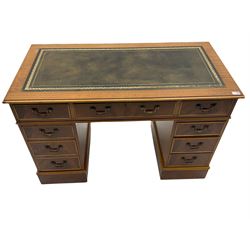 Late 20th century mahogany twin pedestal desk, fitted with nine drawers, inset leather writing surface