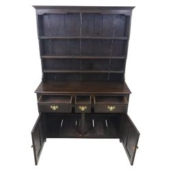 Georgian design oak dresser and rack, fitted with three drawers and two cupboards, complete with three tier plate rack