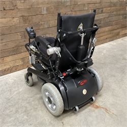 Permobil LSA Lifestand seated and standing wheelchair