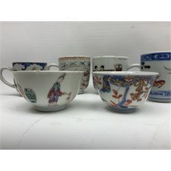 Two 18th century Chinese Yongzheng coffee cups, the first example decorated in polychrome enamel with rooster amidst blossoming peonies, the second decorated with deer and crane among rockwork and pine tree, together with two further 18th century Chinese coffee cups, an 18th century Chinese tea bowl, and a further tea bowl