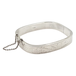 Silver hinged bangle with engraved decoration, hallmarked