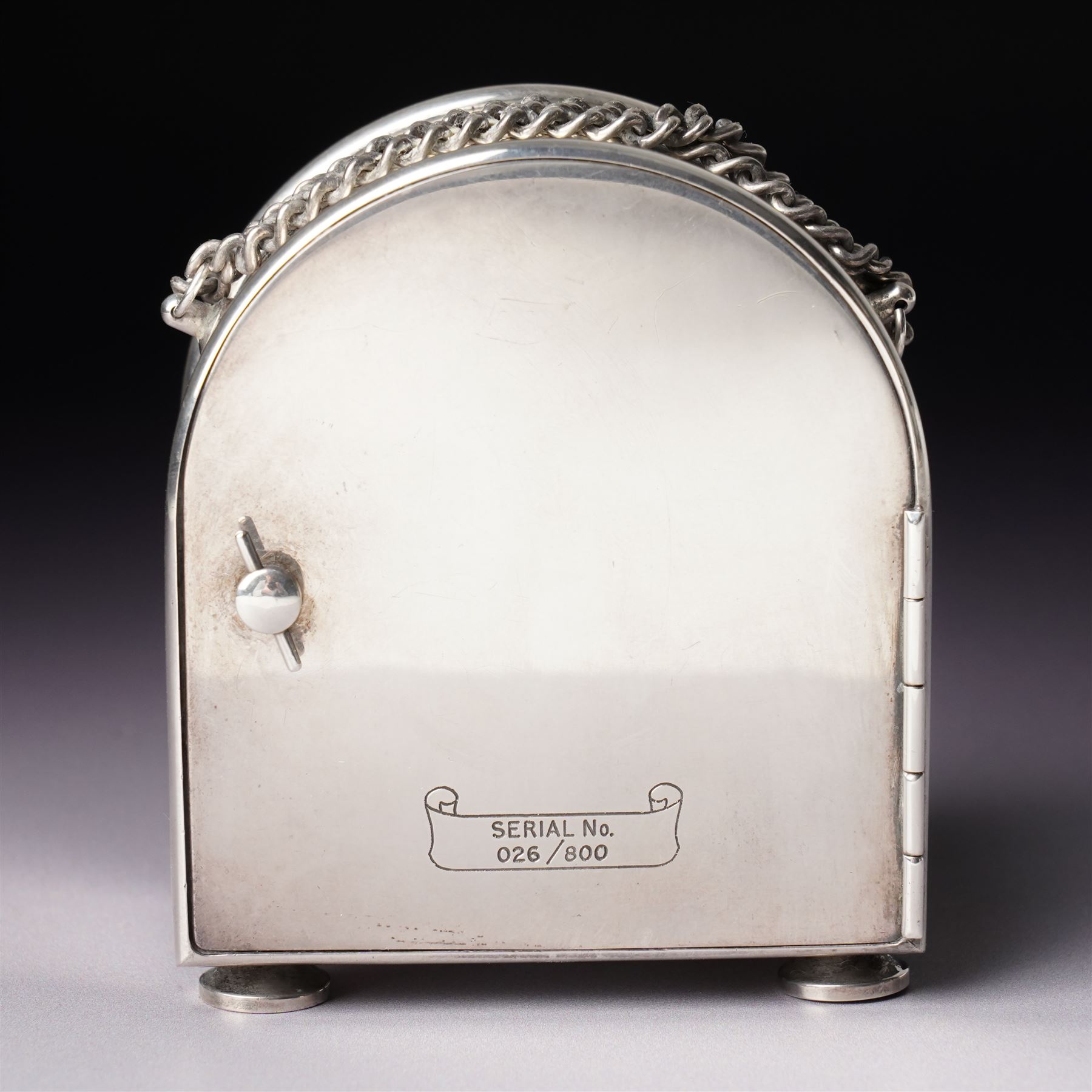 Chas Frodsham - Elizabeth II commemorative miniature carriage clock with platform lever escapement, gilt brass dial inscribed  'Elizabeth of Glamis' in domed silver case with chain handle H8cm London 1980 with key