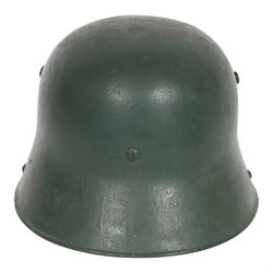 German double decal  M16 helmet with tricolour decal to the right and army eagle to the left, with leather lining and strap 