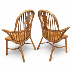 Batheaston Bespoke Furniture, Harrogate - pair of figured oak and ash Windsor armchairs, double hoop and stick back with shaped splats, dished seat on turned supports united by crinoline stretcher