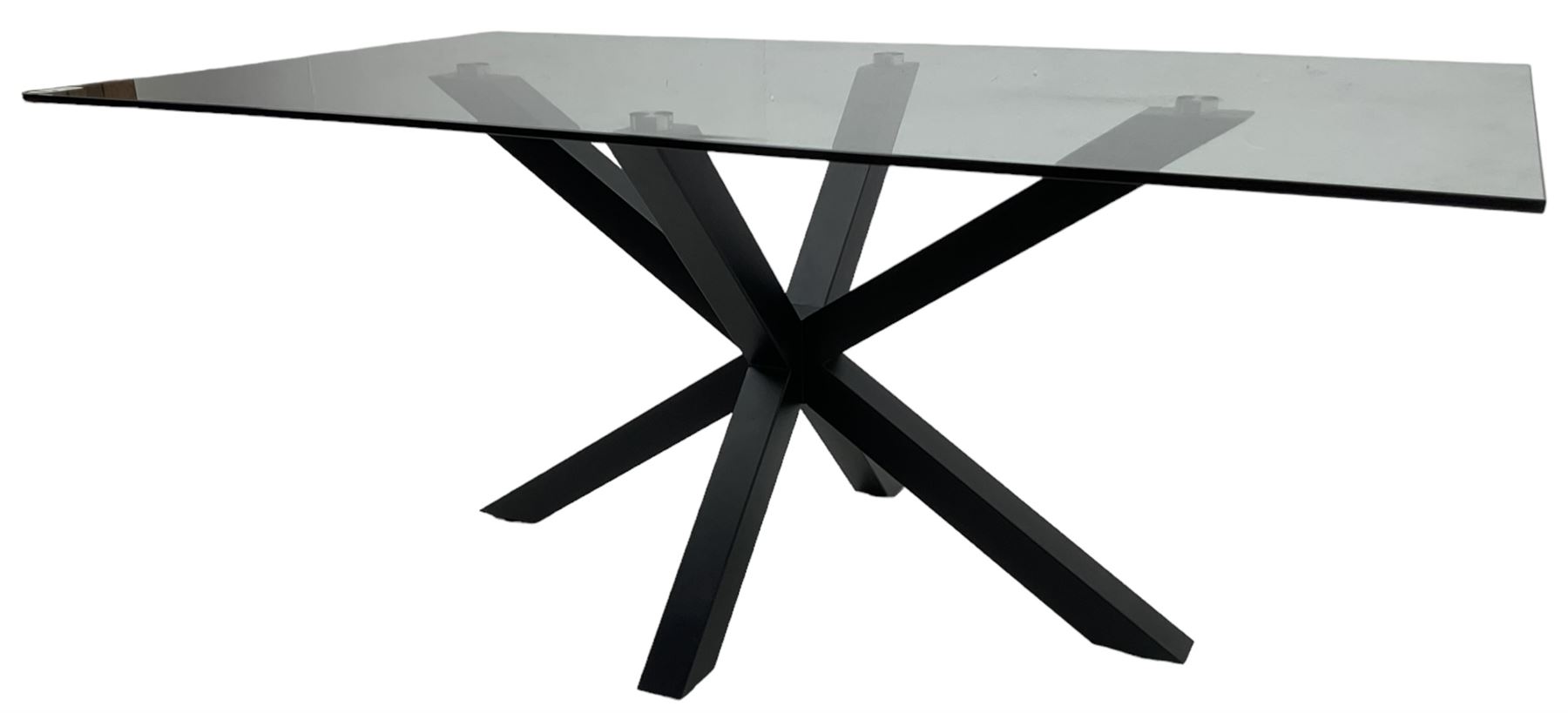 Contemporary glass and metal dining table, rectangular glass top on black finish steel X-framed base