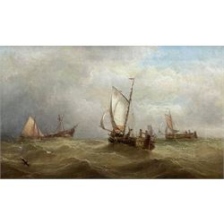 Henry Redmore (British 1820-1887): Fishing Boats and Wreck in Choppy Seas, oil on canvas signed and dated 1884, 35cm x 58cm