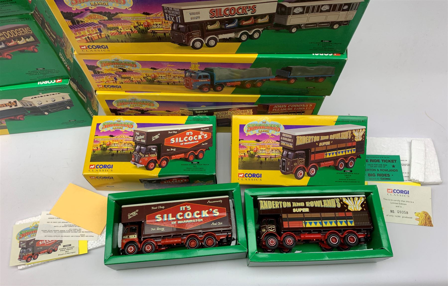 Corgi Showmans Range - twelve vehicles comprising 24801 Leyland Dodgem Truck & Caravan Set, 16501 Scammell Highwayman Ballast with Closed Pole Trailer & Caravan Set, 15901 Scammell Highwayman Generator with Closed Pole Trailer & Dodgem Trailer Set, 16502 Scammell Highwayman Ballast with Closed Pole Trailer & Caravan Set, 21701 AEC Closed Pole Truck with Closed Pole Trailer Set, 12601 Foden Closed Pole Truck Set, 27801 Atkinson Open Pole Truck Set, 09901 ERF Dodgem Truck & Box Trailer Set, 27602 Atkinson 8 Wheel Rigid Truck & Trailer with Loads Set, 24401 Leyland 8 Wheel Rigid Truck Set, 16101 Scammell Highwayman Crane Set and 06601 Morris 1000 Advanced Publicity Van Set; all virtually mint and boxed with certificates and paperwork (12)