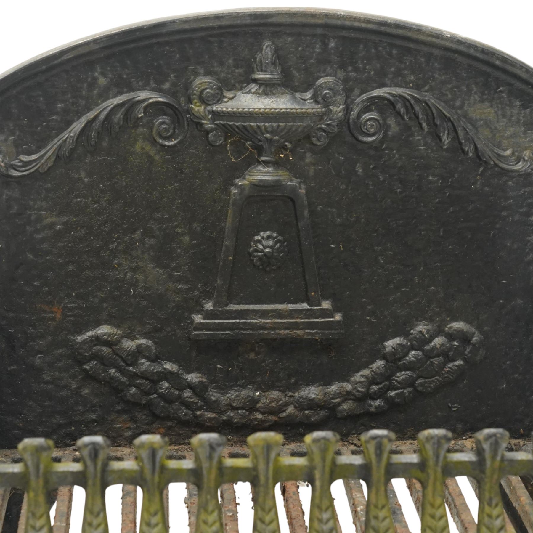 Adam style cast iron fire grate, shaped arched back plate cast with classical urn and scrolling acanthus, railed basket with pierced grate bars, on four cabriole supports