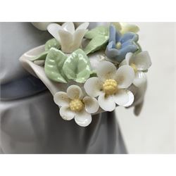 Three Lladro figures comprising, Pocket Full of Wishes no 7650, School Days no 7604 and Spring Bouquets no 7603, all with original boxes, largest example H26cm  