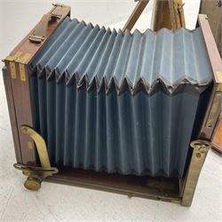 Kieser & Pfeufer folding mahogany and brass full plate camera, with adjustable wooden tripod