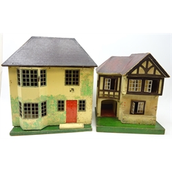  1940s painted wooden and tin plate dolls house, part furnished and a smaller Tri-ang dolls house (2)  