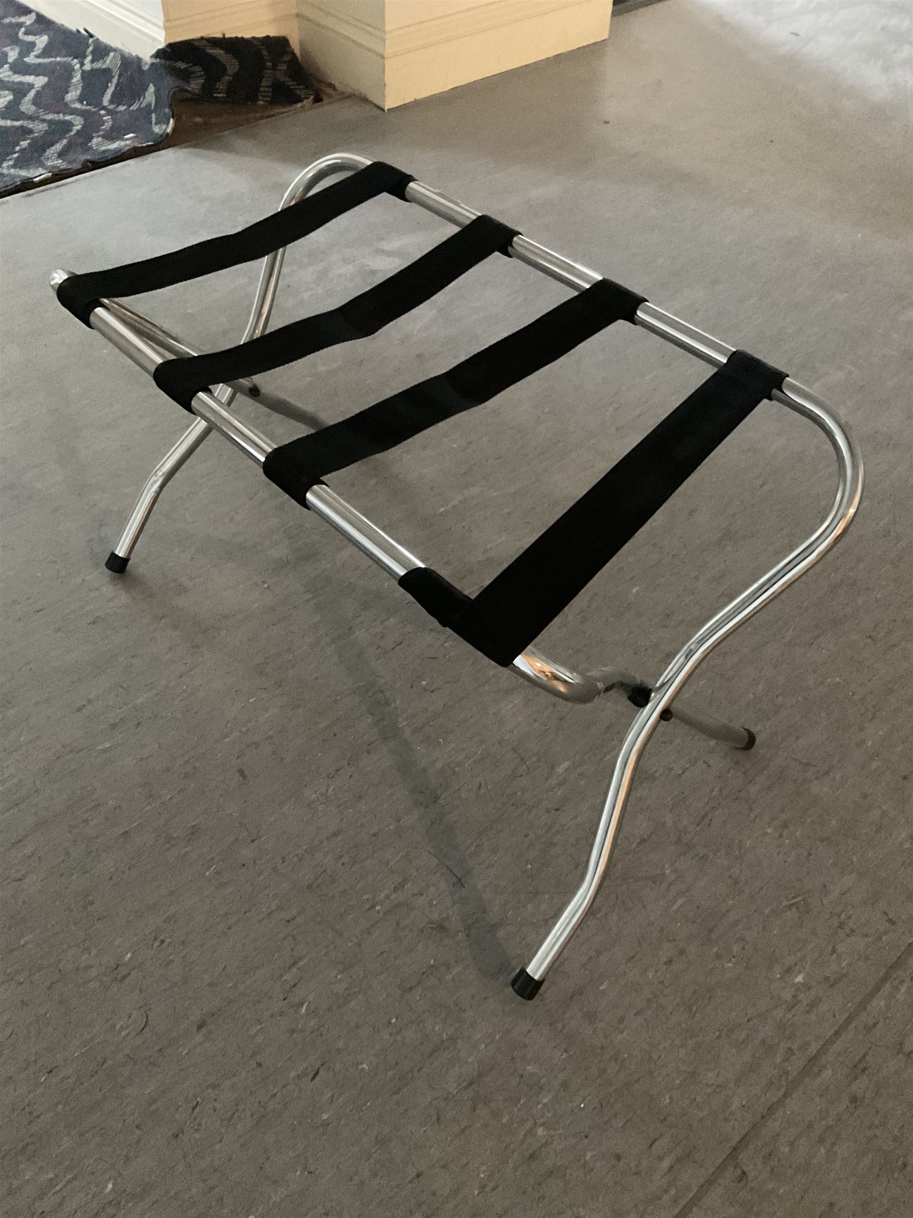 Sixteen folding luggage stands (16)- LOT SUBJECT TO VAT ON THE HAMMER PRICE - To be collected by appointment from The Ambassador Hotel, 36-38 Esplanade, Scarborough YO11 2AY. ALL GOODS MUST BE REMOVED BY WEDNESDAY 15TH JUNE.