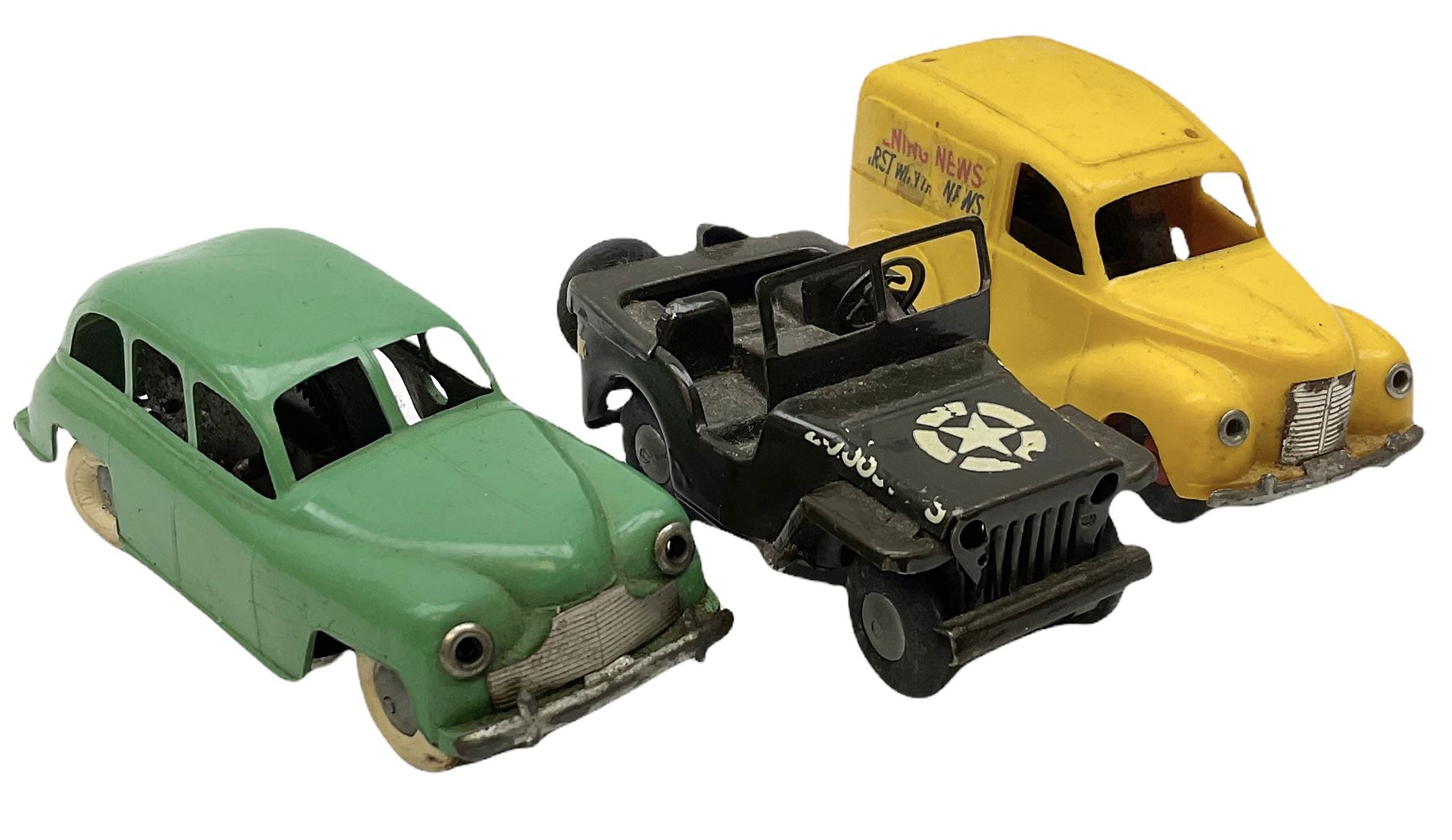 Eight Tri-ang Minic tin-plate/plastic clockwork vehicles comprising Tipper Lorry, Post Office Telephones Van, Caterpillar Tractor, Evening News Van, two Royal Mail Vans, American jeep and saloon car; all unboxed (8)