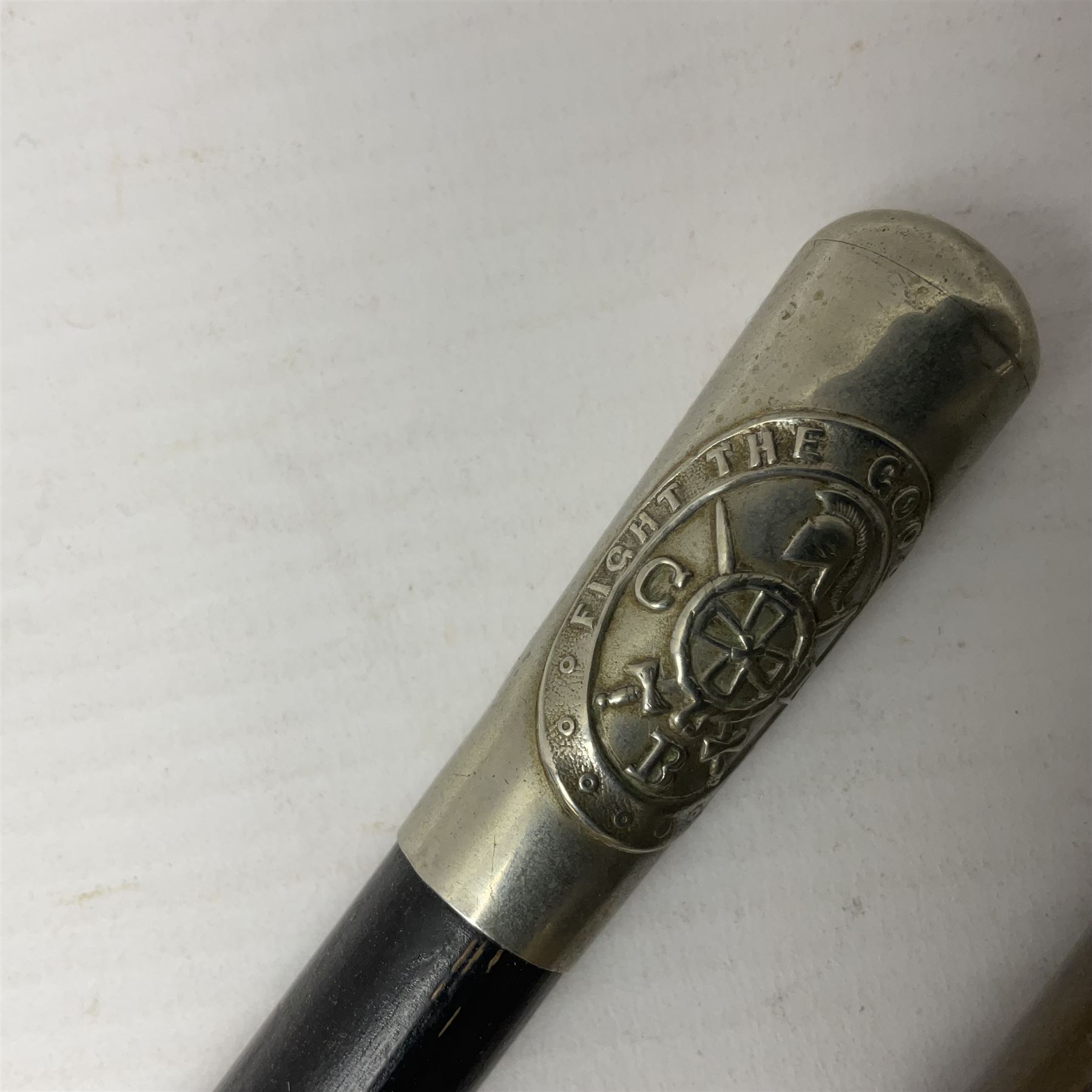 Three parade ground canes - malacca cane Coldstream Guards with plated mount engraved 'H.A. Myhan' L87cm; ebonised Church Lads Brigade 'Fight The Good Fight'; and mahogany stained Worcestershire Regiment (3)