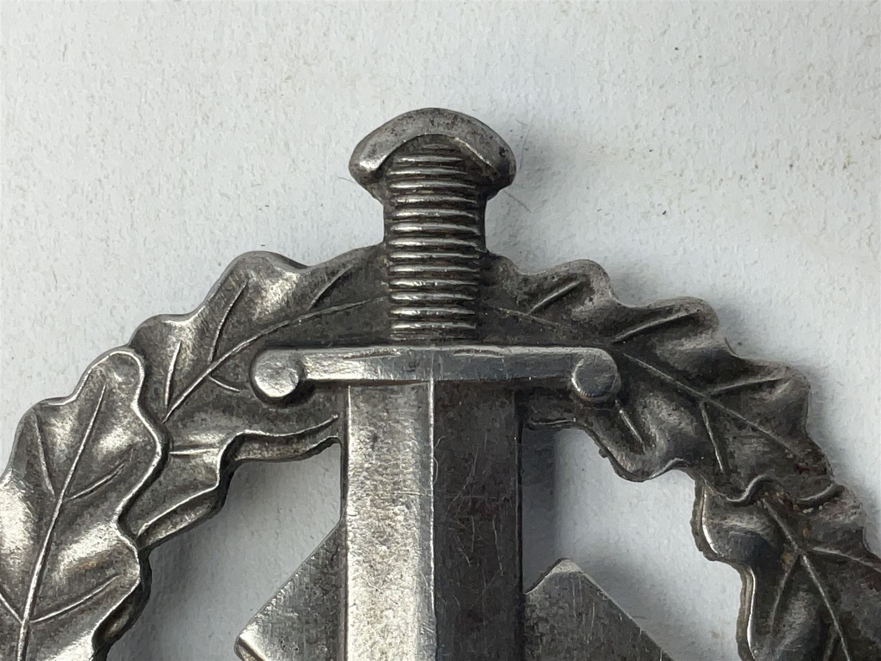 Two WW2 German Sports badges - SA sports badge marked verso 'W.Redo Eigentum D. Obersten SA. Fuhrung Saar Lautern'; and DRL sports badge marked verso 'Wernstein Jena D.R.G.M. 35269' (2)