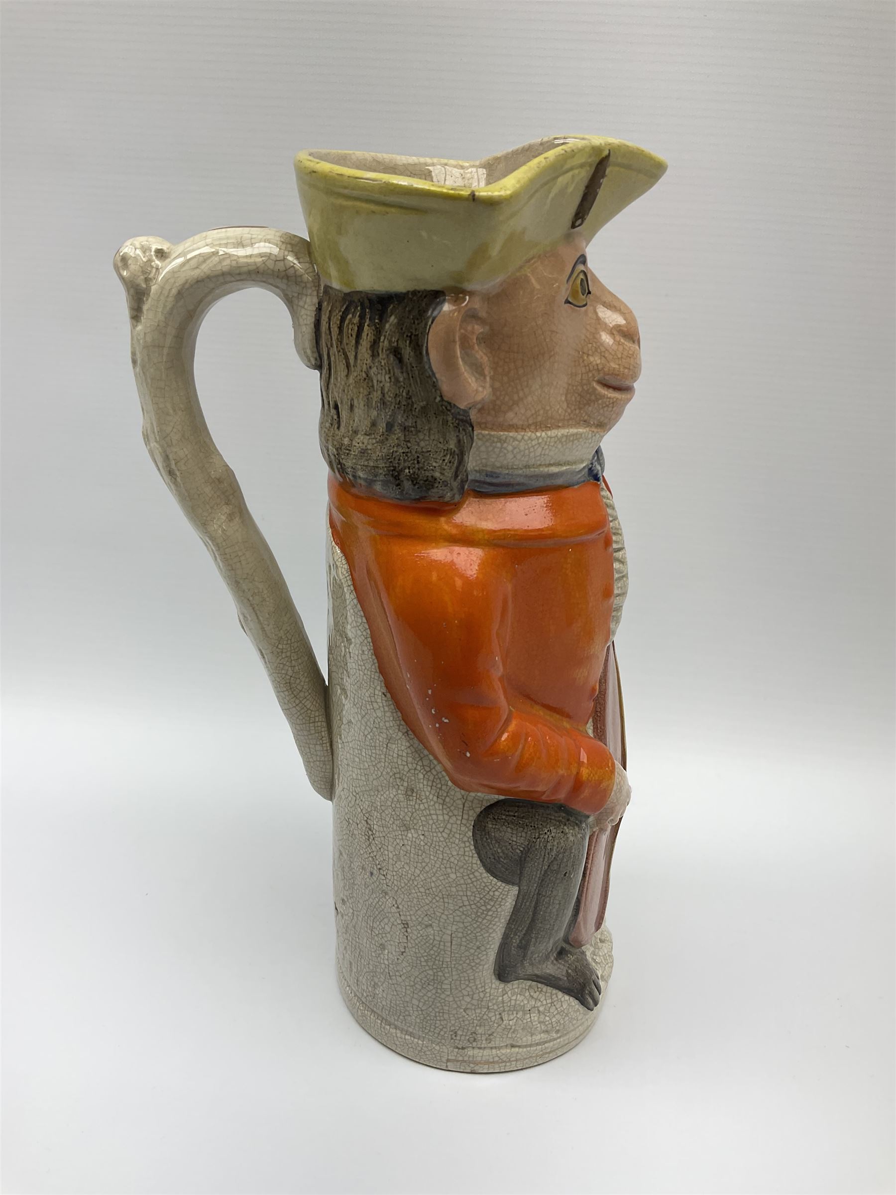 19th century Staffordshire Toby jug modelled as a monkey playing a cello H30cm. 