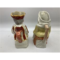19th century and later Toby jugs comprising Staffordshire Punch and Judy jugs, Victorian 'I am on the black list' jug, two jugs in the form of Toby with a jug of beer (5)