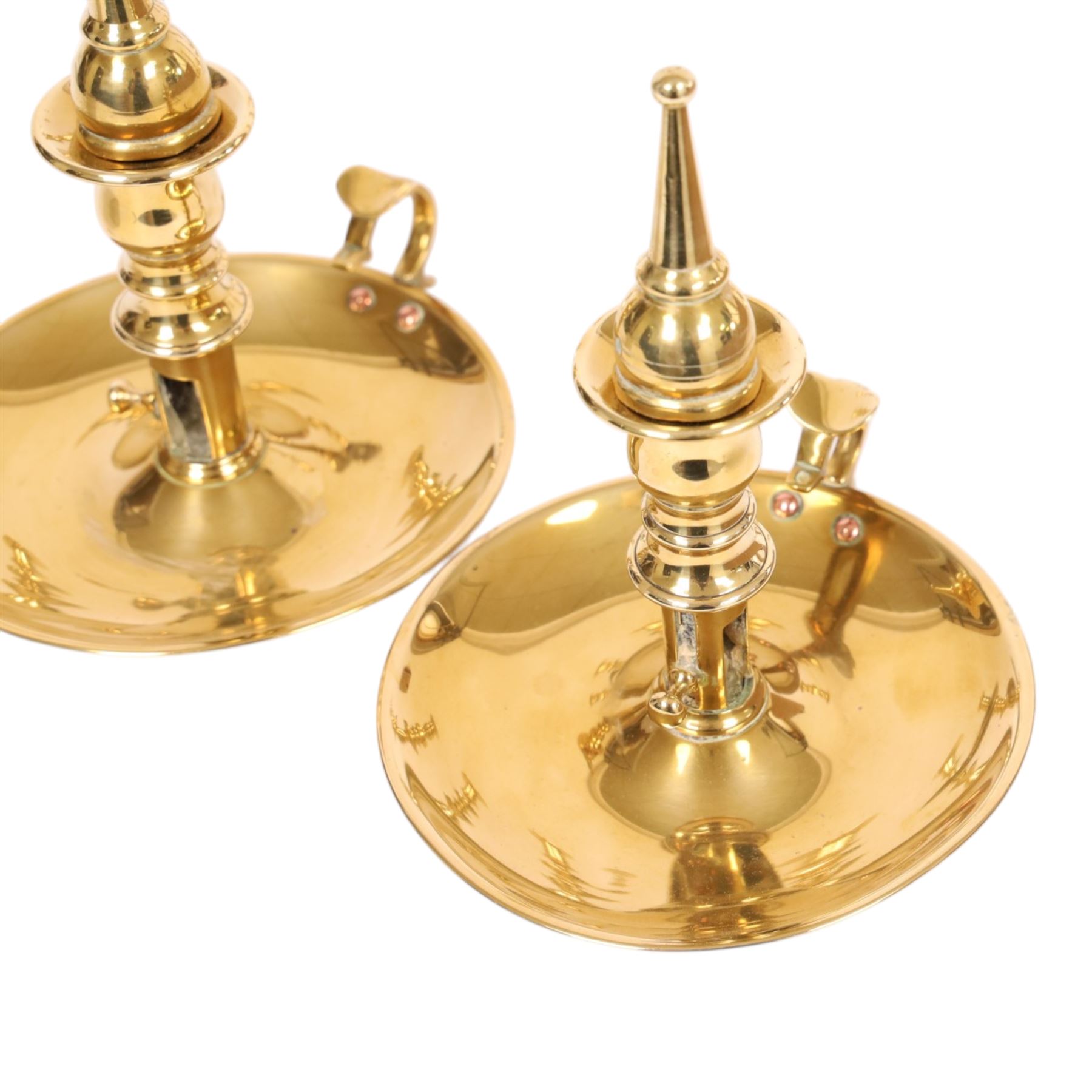 Pair of 19th century brass chamber candlesticks with detachable snuffers, together with three pairs of brass candlesticks 