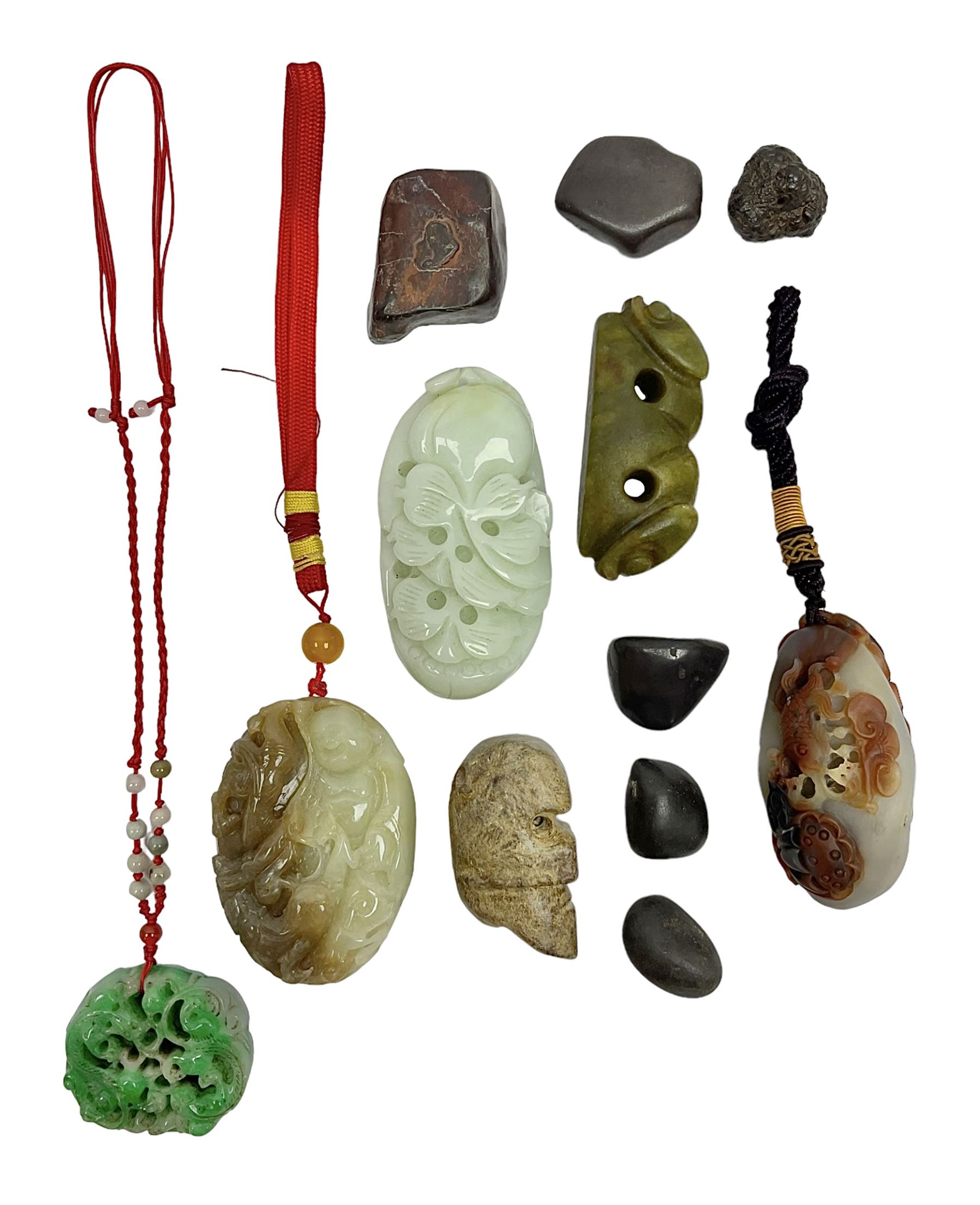 Chinese hardstone carving of a fish amongst coral, with platted rope handle, together with other hardstone and soft stone carvings  