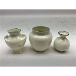 Five crested ware Good Luck black cats, comprising two Willow Art examples, two Arcadian examples and one Carlton China, to include Bridlington, Hull, Filey, etc, tallest H9cm