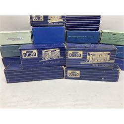 Hornby Dublo - nineteen goods wagons comprising 32040 Goods Van D1 (SR) in LMS stickered box, DR375 Goods Van D1 (GW), D303 Open Goods Wagon D1 (GW), 32044, 32076, 32052, 32021, 32074, 32056, 32065, DR379, 32070, 32020, DR373, two x 32075, High Sided Wagon D2 (LMS) in NE stickered box; all boxed; Tank Wagon D1 (Esso) and DR380 Meat Van D1; both in later unassociated boxes (19)