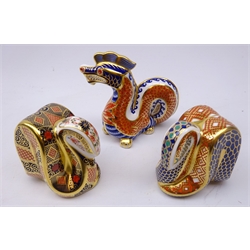  Three Royal Crown Derby paperweights: Dragon dated 1987, gold stopper and two Snakes, Imari dated 2001, gold stopper & the other with silver stopper (3)  