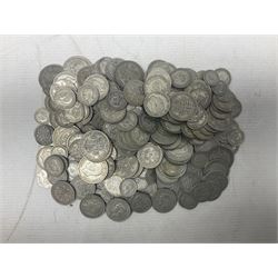 Approximately 1700 grams of Great British pre-1947 silver coins, including half crowns, two shillings / florins, shillings and sixpences