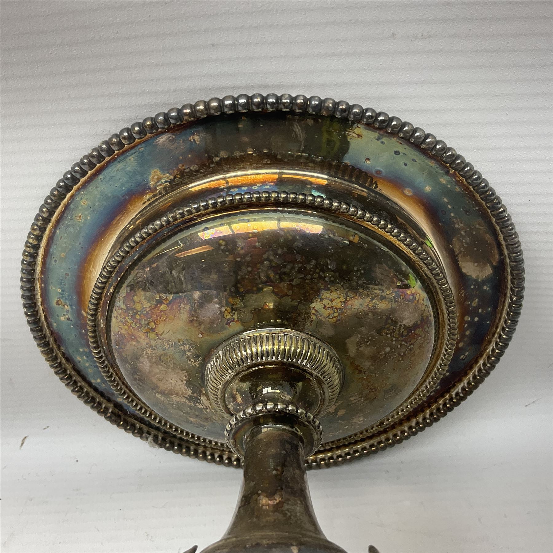 Silver plated centrepiece, with a triform base formed as three Hippocampus with beaded detail, numbered 3682 to the base, H18cm 