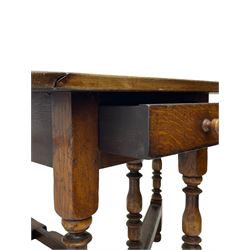 19th century oak dining table, oval drop-leaf top on gate-leg action base, turned supports united by turned stretchers, fitted with single end drawer