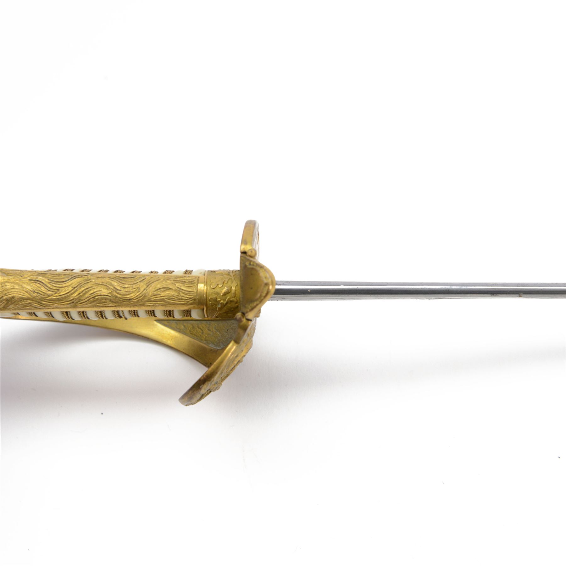 WWII German Kriegsmarine naval officers sword, the 79cm single edged blade marked Carl Eickhorn Solingen, brass hilt with anchor to folding guard, lion mask pommel, wirebound cream plastic ivorine grip, with leather scabbard with brass-mounted and single suspension ring, sword and scabbard marked 0.1735, overall L96cm  