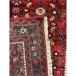 North West Persian Malayer runner, red ground field decorated with Herati motifs, guarded border decorated with trailing flowerhead band 