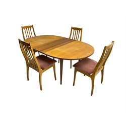 Portwood Furniture - mid-20th century teak extending dining table, oval top over four shaped tapering supports (W137cm D106cm H73cm); and set four dining chairs, slatted back over pink upholstered seat (W50cm D50cm H96cm)