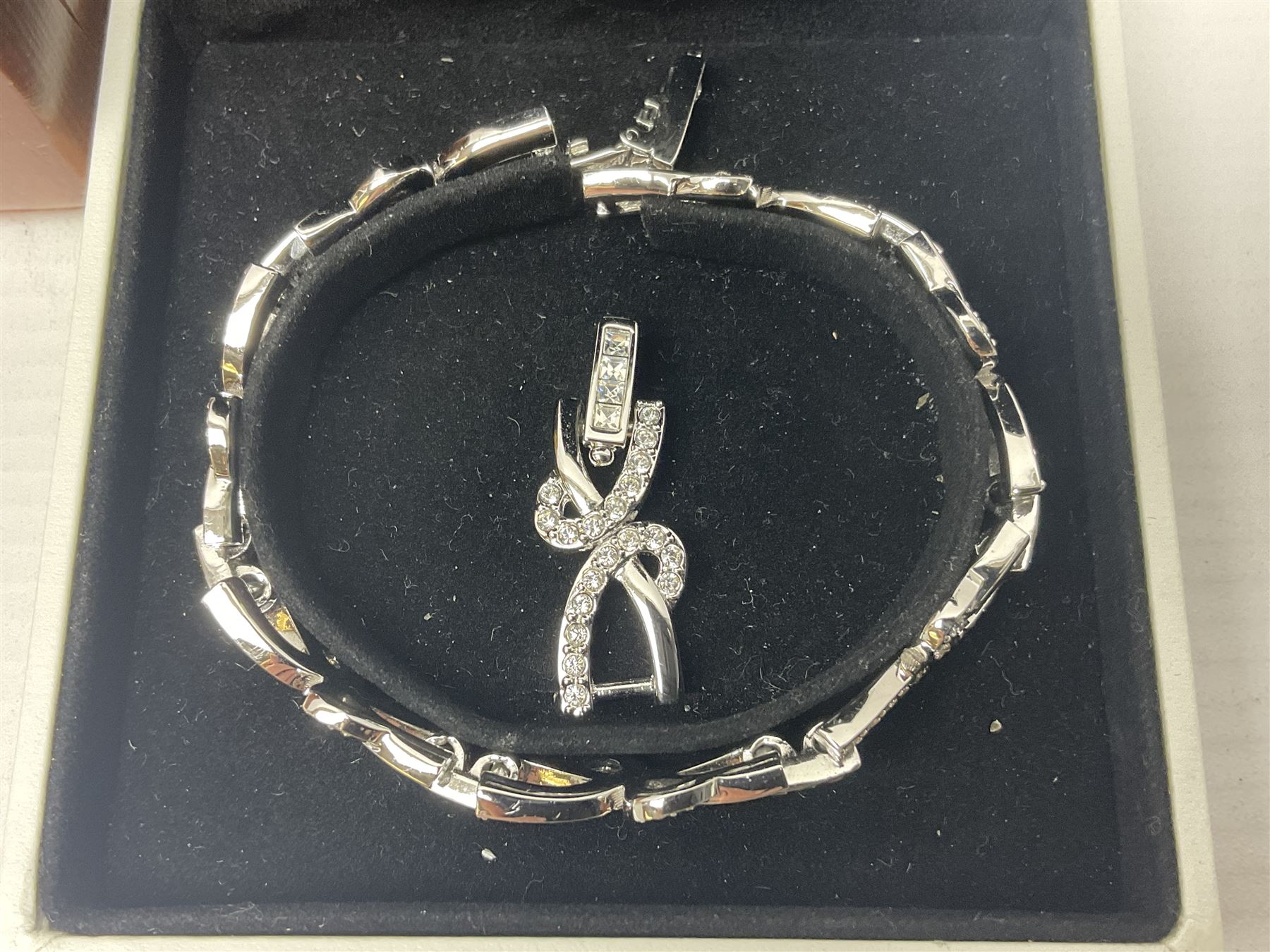 Maurice Lacroix gentlemans quartz wristwatch, 92127, with gold plated case, date apeture and leather strap, together with a Swarovski Crystal bracelet, two silver brooches and two costume brooches