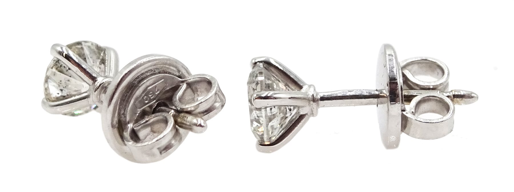  Pair of 18ct white gold round brilliant cut diamond stud earrings, hallmarked, diamond total weight 1.05 carat  