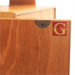 G Plan - Mid 20th century teak units, comprising tall shelving unit with cupboard sections, fall front and open shelves, together with a low twin-door cupboard unit, on plinth bases

Low unit: H 53cm, D 46cm, W 81cm
Tall unit: H 199cm, D 46cm, W 76cm