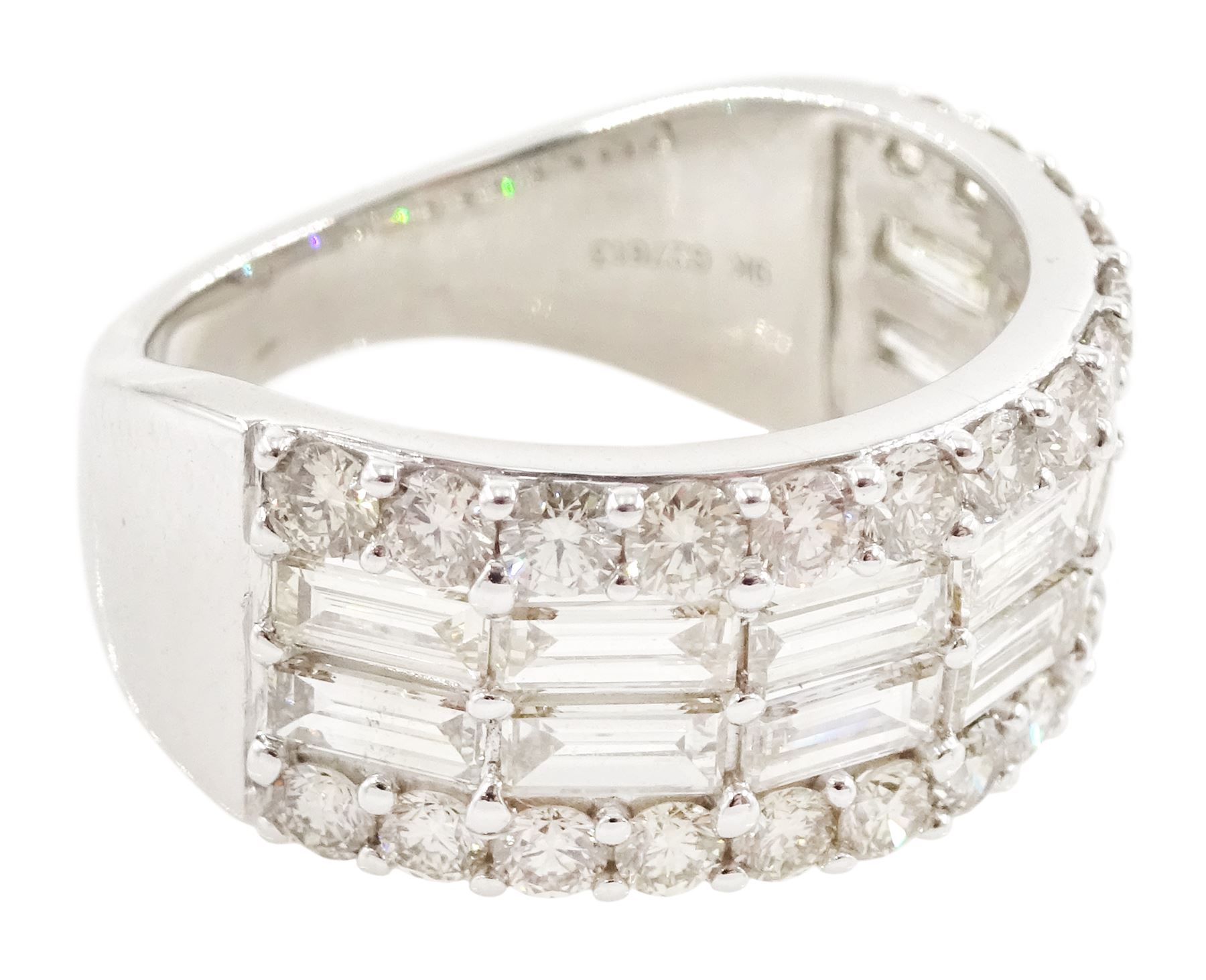 White gold four row, round brilliant cut and baguette cut diamond ring hallmarked 9ct, total diamond weight 2.72 carat 