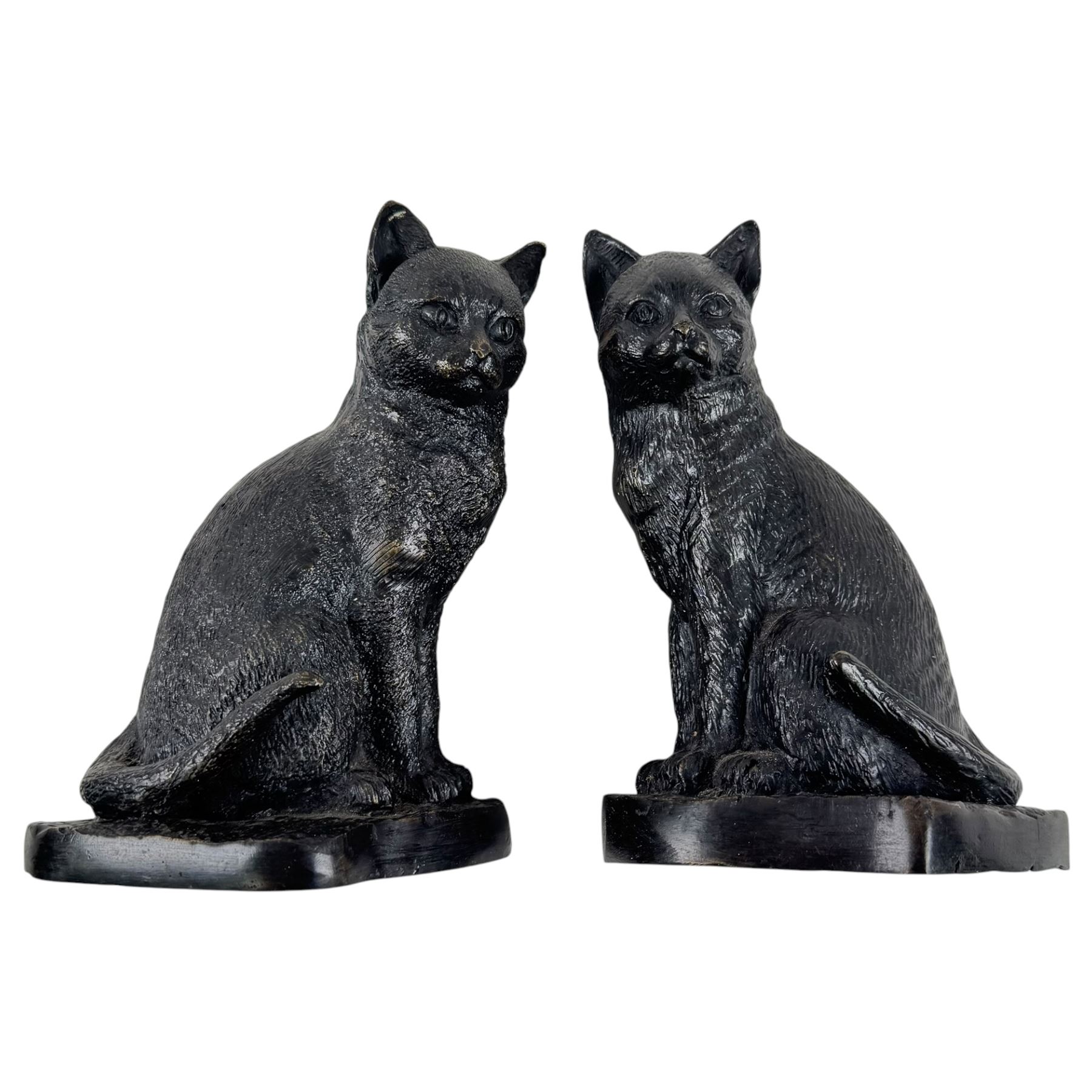 Brass bookends modelled as bulls, together with brass hose and three others 