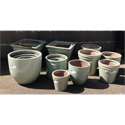  Six graduating square tapering glazed ceramic planters, five egg pots, five traditional pots and four tapering pots (20)  