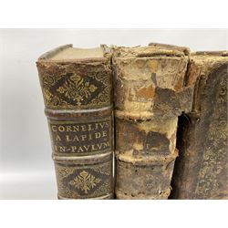 Three 17th century Lugduni (Lyon) printed books each with engraved title page in red and black comprising R.P. Corn Cornelii A Lapide .... Tomus Primus. 1690; R.P. Cornelii Cornelii A Lapide .... 1683; and Hortus Pastorum Sacrae Doctrinae Floribus Polymitus .... 1668. All folio with full calf bindings (3)
