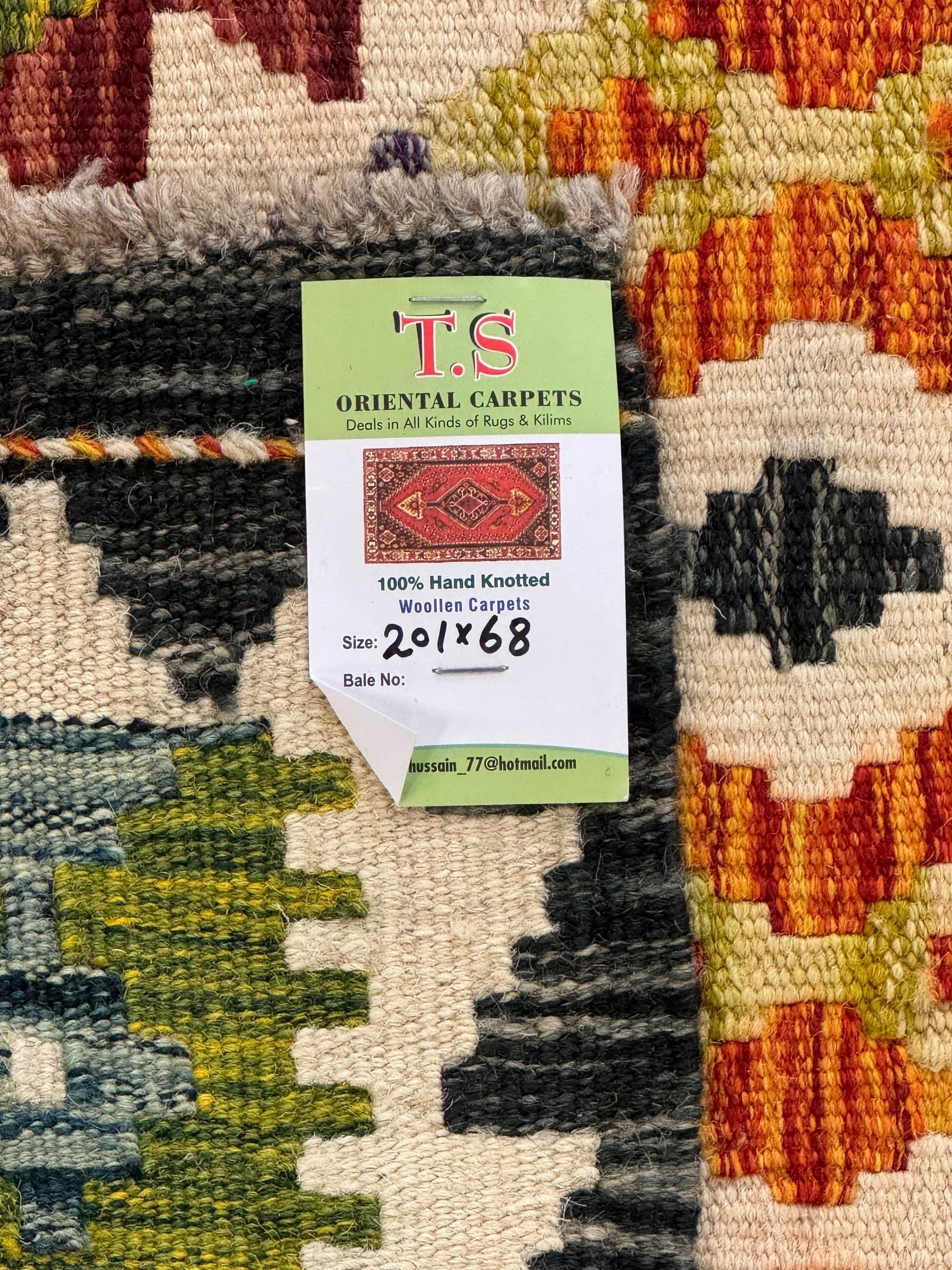 Chobi kilim multi-colour ground runner, the field decorated with lozenges and geometric patterns, within hooked border 