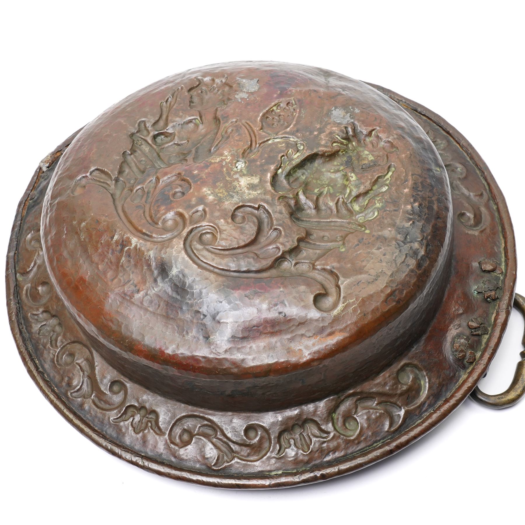 18th century Venetian copper two handled brazier, the base embossed with figures emerging from a cornucopia and a bishop's mitre, the border with embossed scrolls etc D50cm