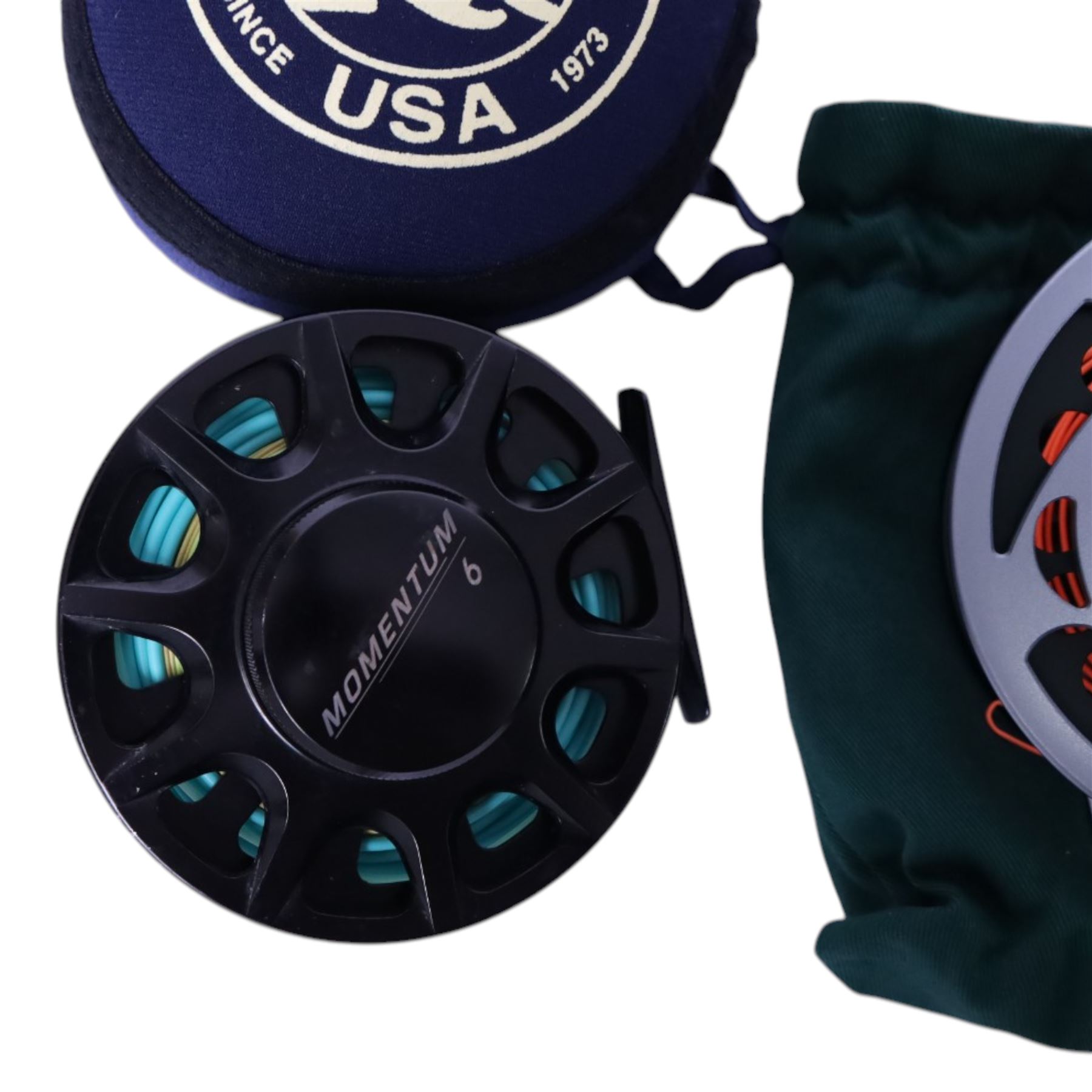 Three fly fishing reels, comprising The Fly Reel Company Limited Reel Britannia RB1 reel, Ross Reels Momentum 6 and a Vosso HD 911, all within pouches