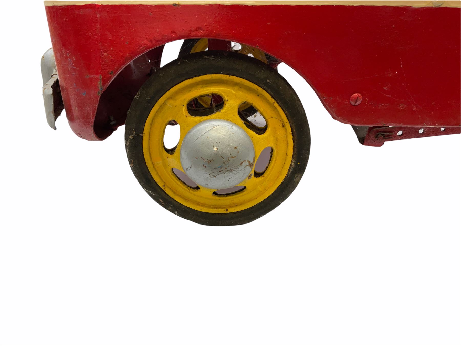 1950s child's tin-plate pedal car, possibly by Tri-ang, painted white and red and named 'Crusader' L104cm