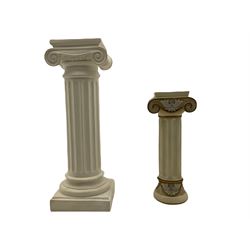 Classical Ionic style column in white finish with scrolled capital, fluted body on moulded plinth base (H97cm), and a similar small column stand (H68cm)