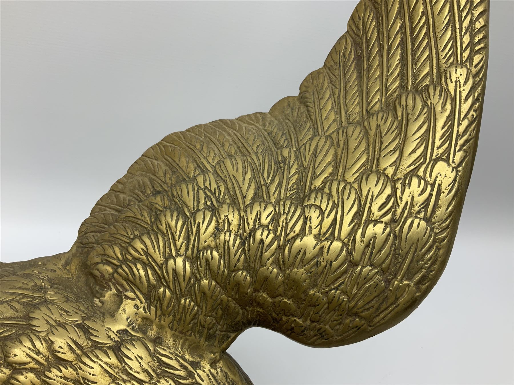 Large brass figure of an eagle on a branch, H51.5cm