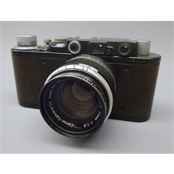  Leica 35mm film camera, Ernst Leitz Wetzlar D.R.P. No.91677, black with a Canon f1:1.8 50mm lens and cover  