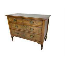 Edwardian walnut straight front chest, fitted with three graduating drawers with figured bookmatched veneer fronts, raised on turned supports