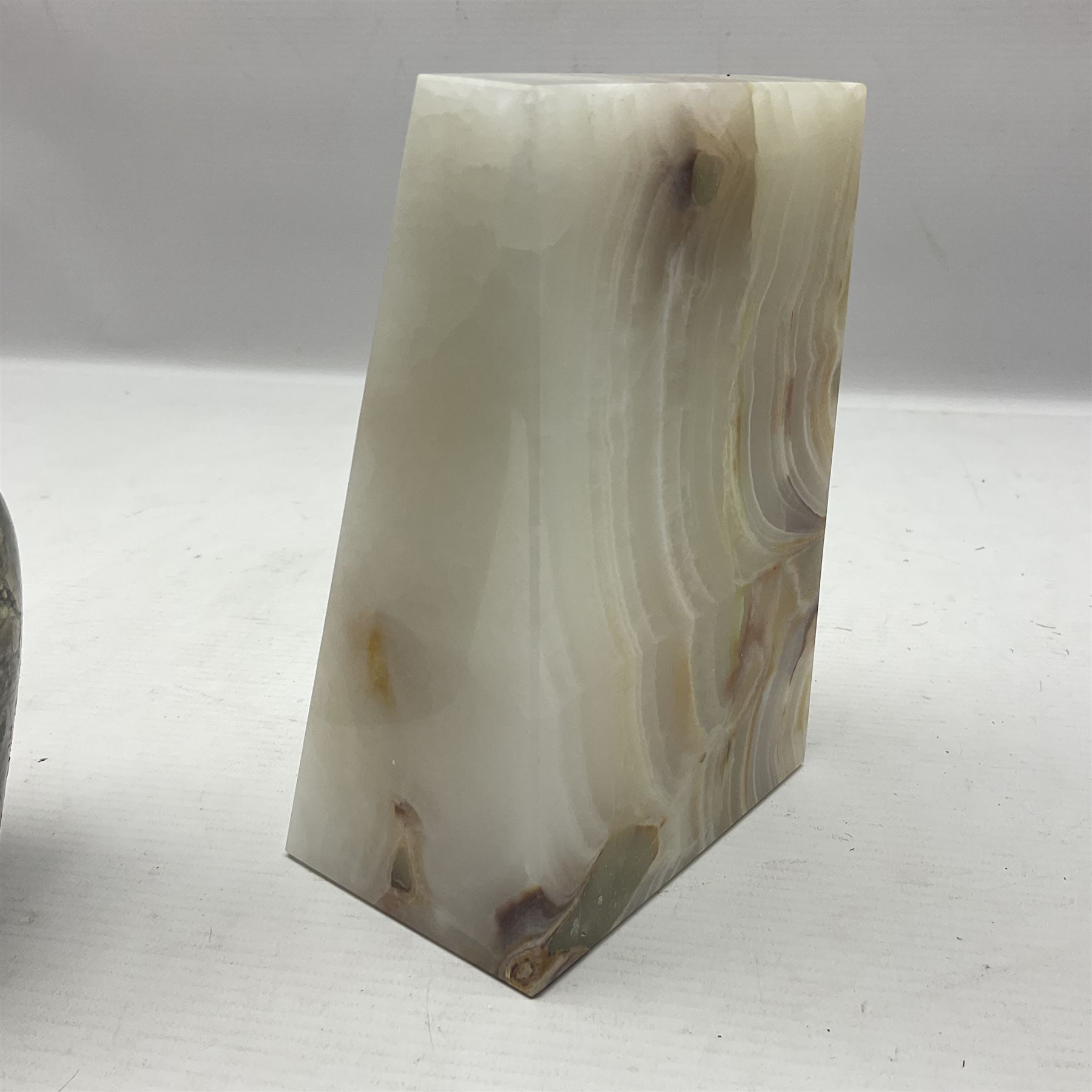 Alabaster bookends, together with marble vase 