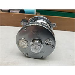 Four Abu fishing reels, comprising Ambassadeur 9000, Ambassadeur 7000, Ambassadeur 5500 and Ambassadeur 6500, together with additional line, hardy fishing bag and two wooden boxes