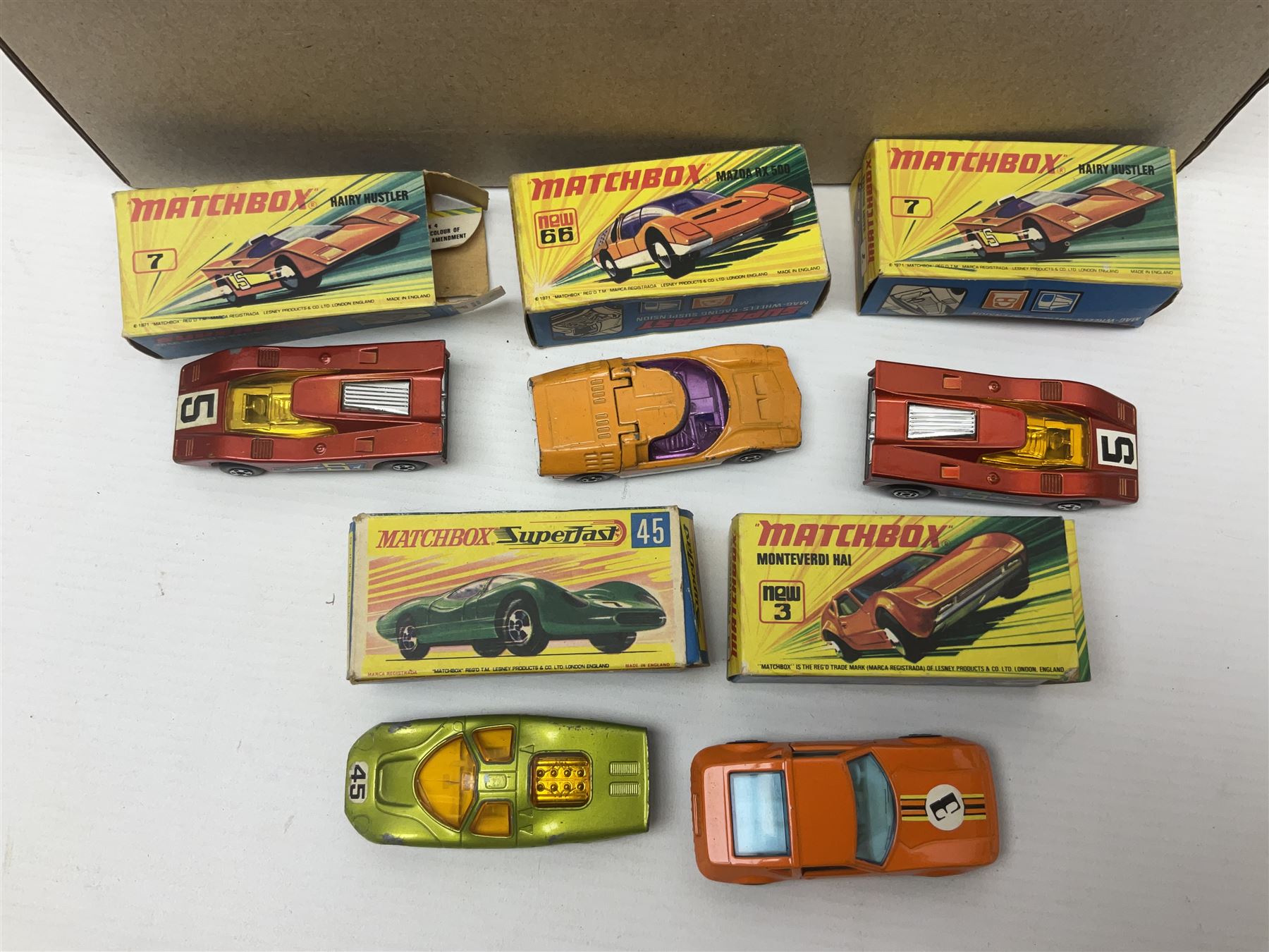 Matchbox Superfast track racing Set with Superbooster and two boxed SF-17 Slipstream Curves; together with five boxed Superfast models - 3d Monteverdi Hai, two 7d Hairy Hustler, 45c Ford Group 6 and 66d Mazda RX500; and quantity of unboxed and playworn other die-cast models